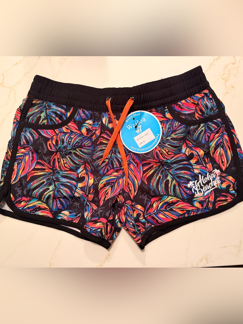 Women's Black Tropical Print Board Shorts with Orange Drawcord